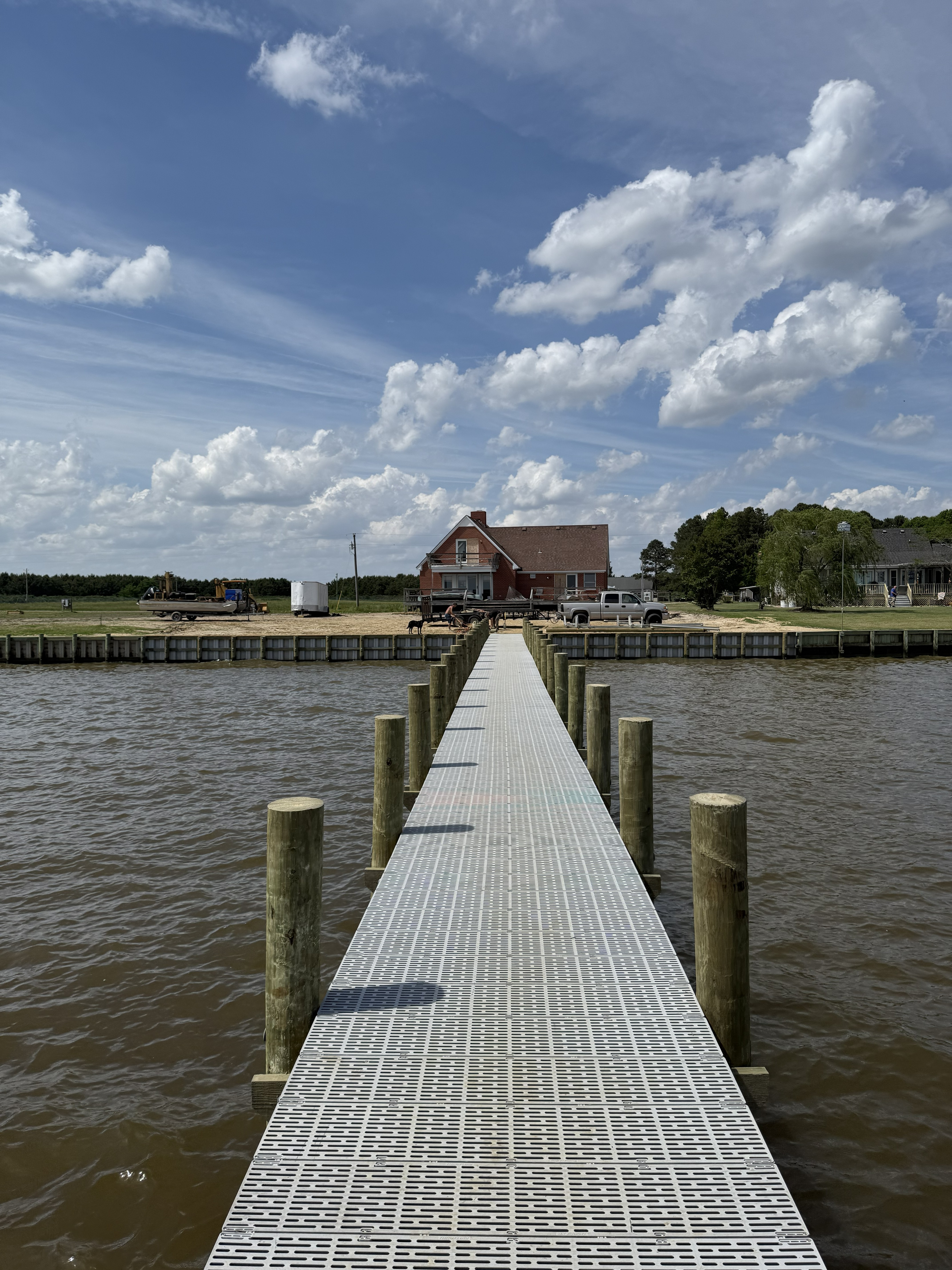Long wooden pier extending into the water