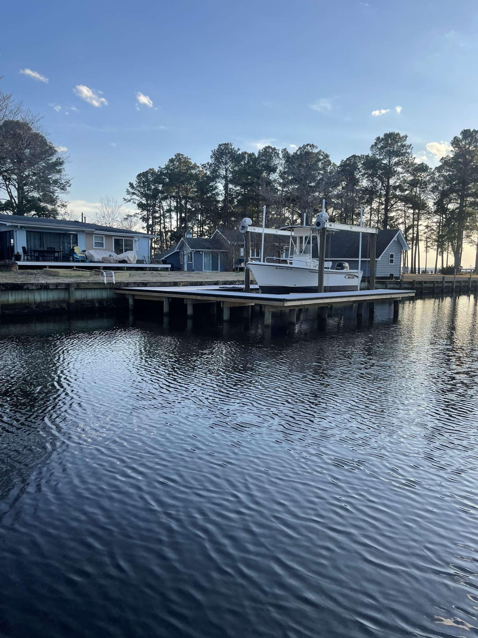 Flow-through pier decking over water